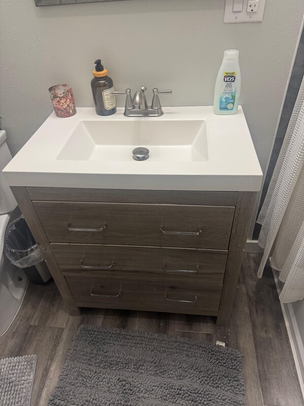 Hair dryer, towels, soap, shampoo