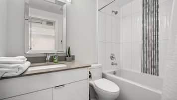 Hair dryer, towels, soap, toilet paper