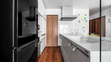 Apartment | Private kitchen | Fridge, microwave, stovetop, cookware/dishes/utensils