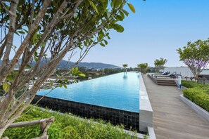 Outdoor pool, pool loungers - Skypark Celeste Laguna by TropicLook (Choeng Thale)