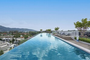 Outdoor pool, sun loungers - Skypark Celeste Laguna by TropicLook (Choeng Thale)