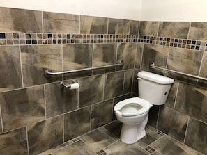 Shower, towels, soap, toilet paper