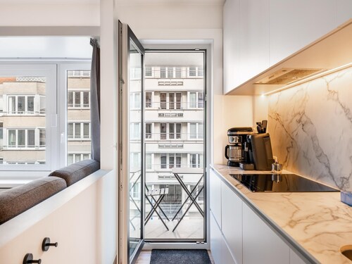 Renovated apartment with side sea view.