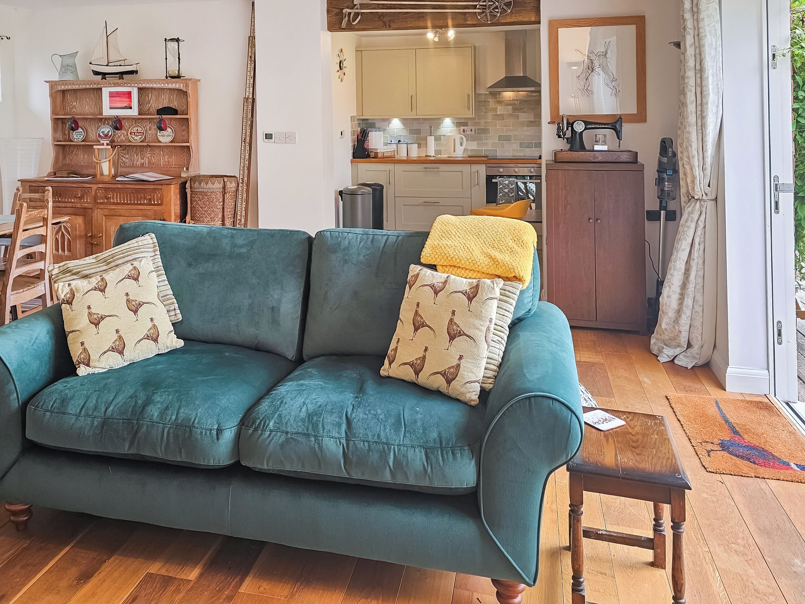 Open plan kitchen, lounge and dining opening up to south facing deck. | Little Marsh, Aldeby