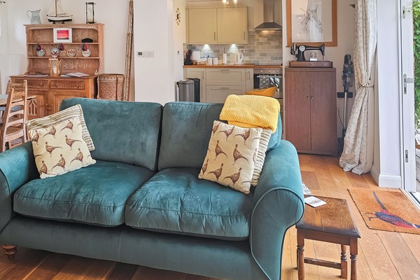 Open plan kitchen, lounge and dining opening up to south facing deck. | Little Marsh, Aldeby