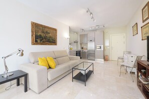 Comfort Apartment, 1 Bedroom, Beachside | Living area - Solaga - Maestranza (Málaga)
