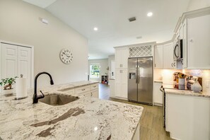 Fridge, microwave, stovetop, dishwasher - Fun in the Sun! Modern Palm Bay Gem w/ Pool + Yard (Palm Bay)
