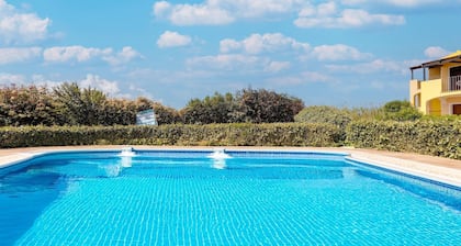 Holiday home with air conditioning and shared pool