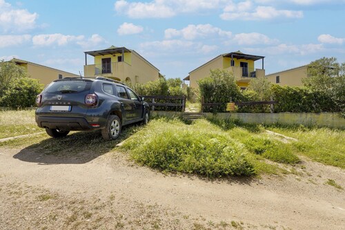 Holiday home with air conditioning and shared pool
