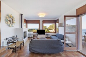 TV, fireplace - Villa with Pool and Spectacular Sea Views (Sa Riera)