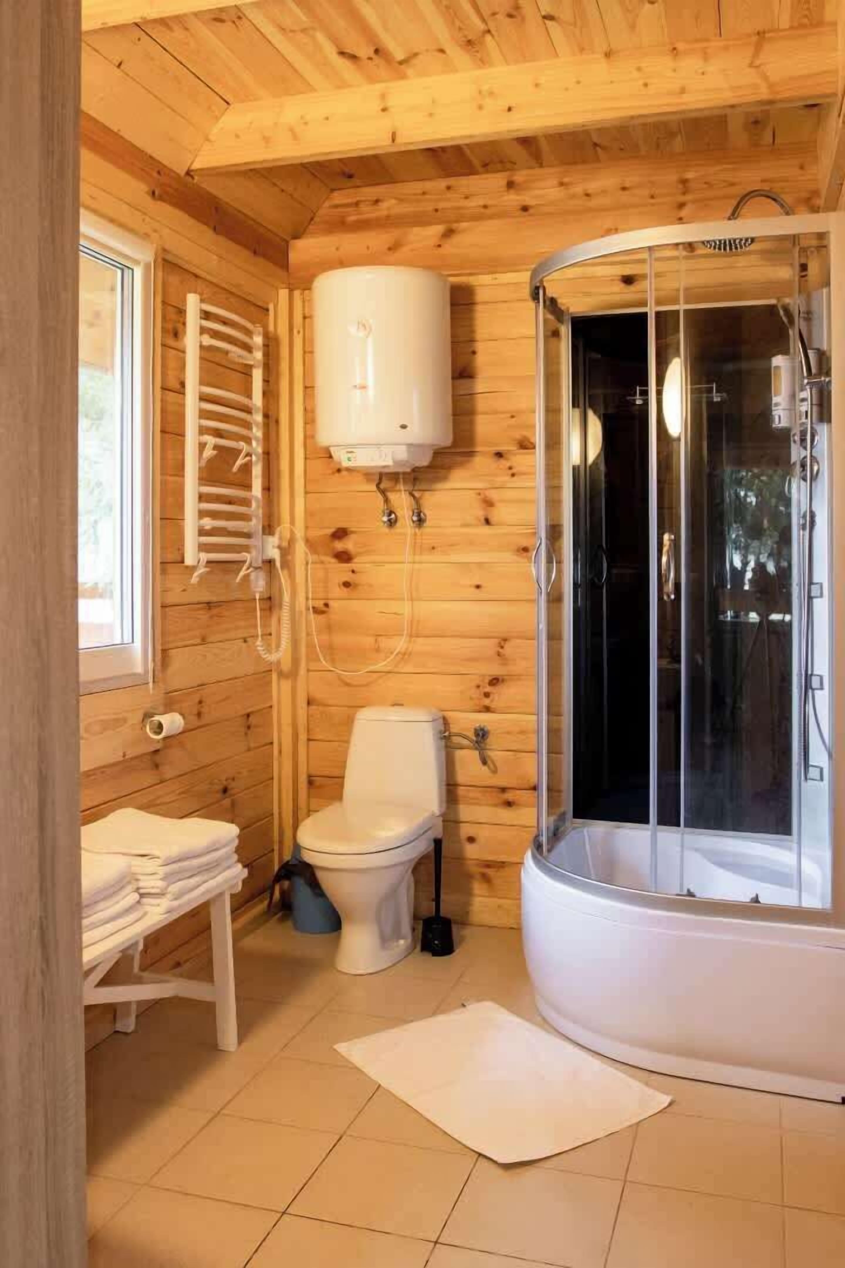 Shower, towels, soap, toilet paper