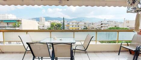 Apartment, Balcony, City View | Outdoor dining