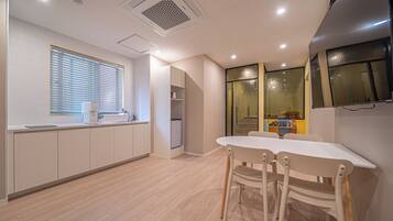 Family Room, City View | Dining