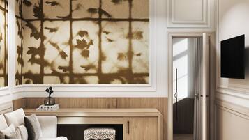 Junior Suite, Balcony, Garden View | Living area