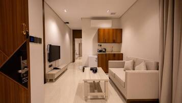 Departamento, 2 habitaciones | Área de sala de estar