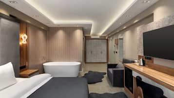 Deluxe Room, 1 King Bed | In-room safe, iron/ironing board