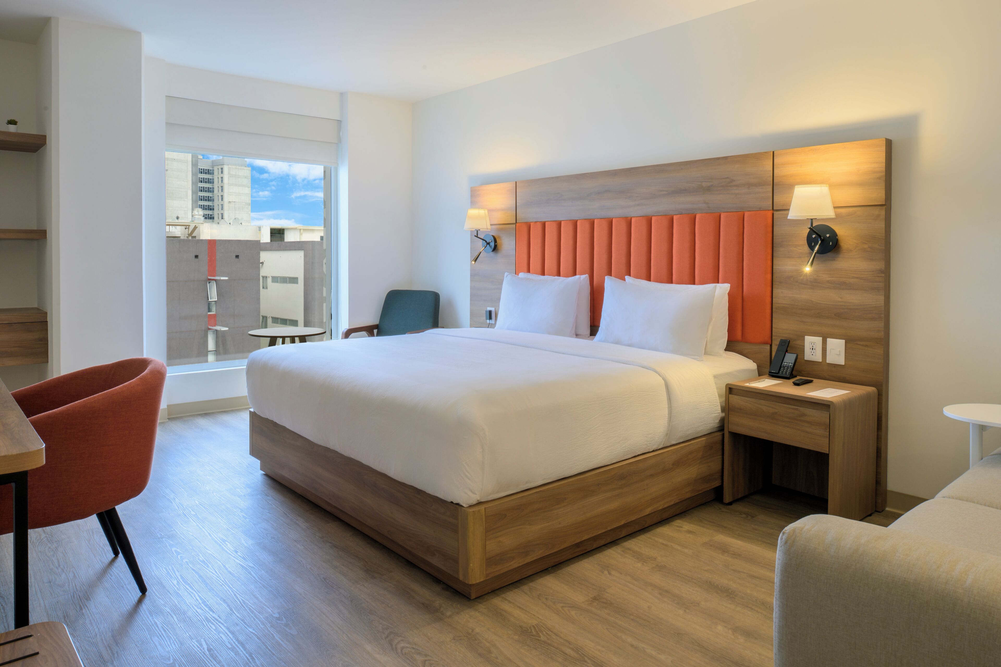 Deluxe Studio Suite, 1 Bedroom, City View | Minibar, in-room safe, desk, laptop workspace