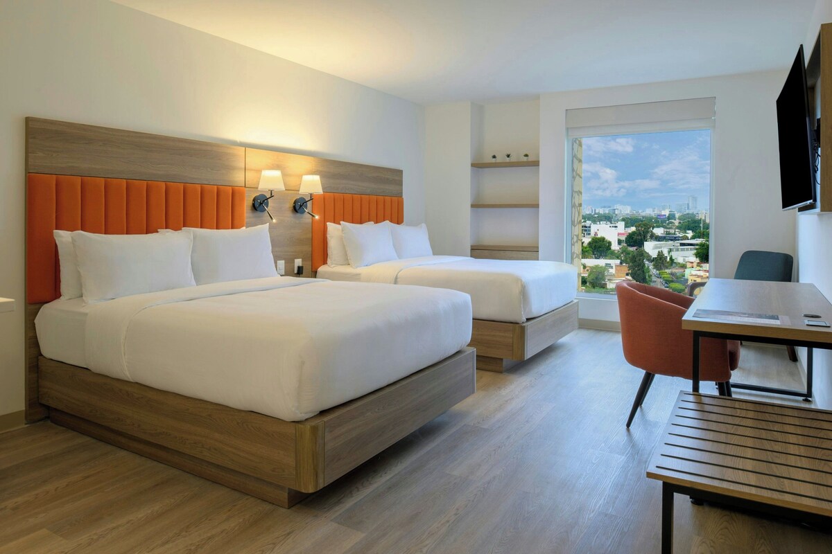 Studio Suite, 1 Bedroom, City View | Minibar, in-room safe, desk, laptop workspace