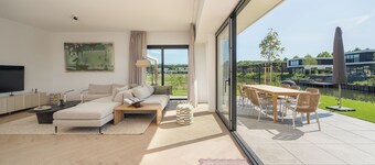 Brand new 8-person accessible villa on the water with hot tub, sauna, and swing