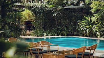 Outdoor pool, pool umbrellas, sun loungers