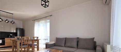 Basic Apartment, Balcony, Lake View | Living area