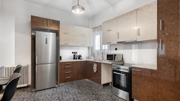 Apartamento superior, vistas al mar | Cocina privada
