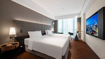 Habitación superior con 2 camas individuales, vista a la ciudad