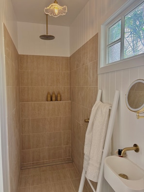 Shower, hair dryer, towels, soap