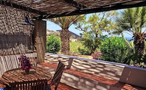 Family Apartment, Balcony, Sea View | Outdoor dining