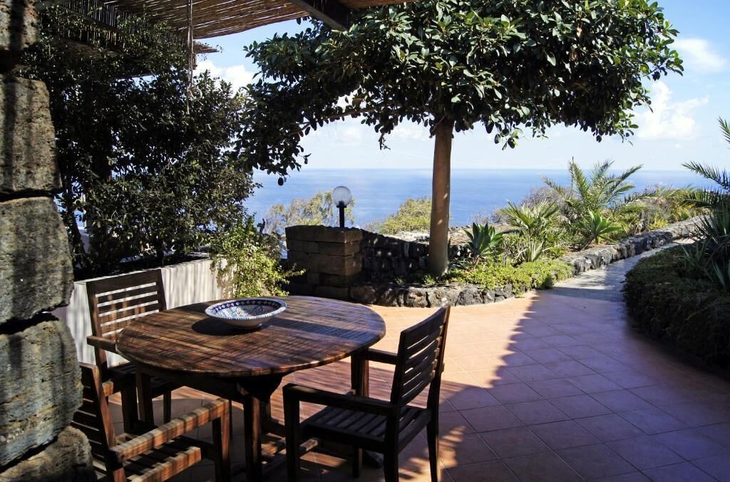 Deluxe appartement, uitzicht op zee | Buiten dineren