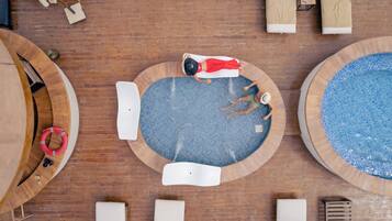 2 outdoor pools, pool umbrellas, pool loungers