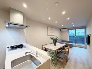 Appartamento Exclusive | Cucina privata | Frigorifero, microonde, piano cottura, bollitore elettrico