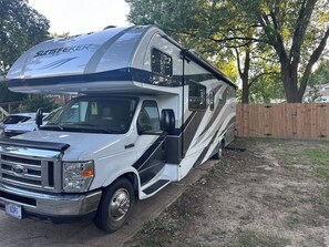 Property grounds - 15 Minutes From FIFA Events Full RV Fixed location. (Independence)