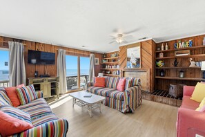 Living area - BECOME AN ISLAND CASTAWAY in this cozy, fun in the sun, beachfront home. (St. George Island)