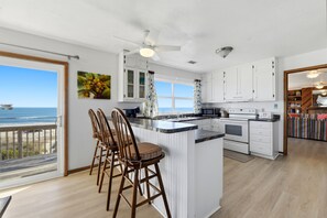 Private kitchen - BECOME AN ISLAND CASTAWAY in this cozy, fun in the sun, beachfront home. (St. George Island)