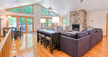 Lakefront home with deck, hot tub, game room, kayaks, & fireplace