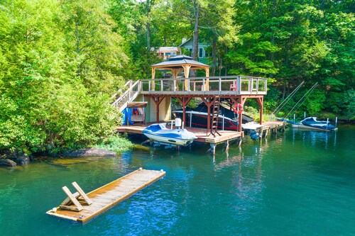 Lakefront home with granite counters, fireplace, lake views, & dock