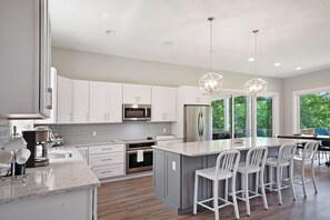 Fridge, microwave, oven, stovetop - Custom lakefront home with private beach, dock & firepit (Bumpass)