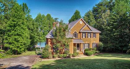 Lakefront home with boat dock, private firepit & game room - dog-friendly