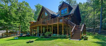 Luxurious lakefront cabin with hot tub, game room, & washer/dryer- dog friendly