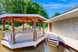 Terrace/patio - Stunning lakefront retreat w/firepit, game room, & water views (Bumpass)