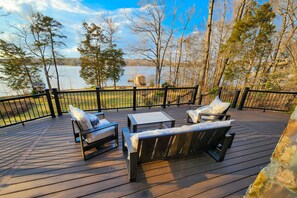 Terrace/patio - Enchanting lakefront oasis with fire pit, generous patio, dock, & amazing views (Mineral)