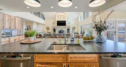 Dog-friendly lakefront home with a game room, children's items, and firepit