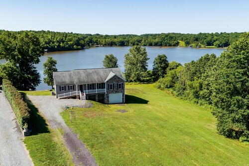 Two-story, lakefront getaway with dock, beach, grill, 2 kayaks, 2 canoes, AC