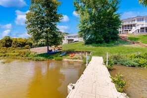 Property grounds - Two-story, lakefront getaway with dock, beach, grill, 2 kayaks, 2 canoes, AC (Orange)