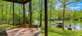 Serene lakefront home with free WiFi, private dock, game room, & central AC