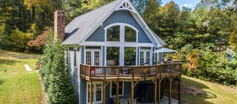 Beautiful lakefront home with fireplace, deck, central AC, & washer/dryer