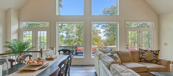 Beautiful lakefront home with fireplace, deck, central AC, & washer/dryer