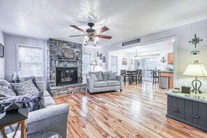 TV, fireplace, books
