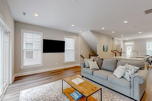 TV - Charming lakefront retreat with game room and covered dock access (Mineral)